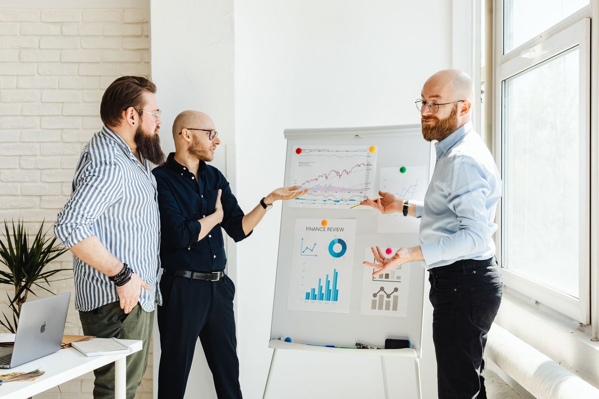 Side-by-side comparison of hiring versus automating admin work