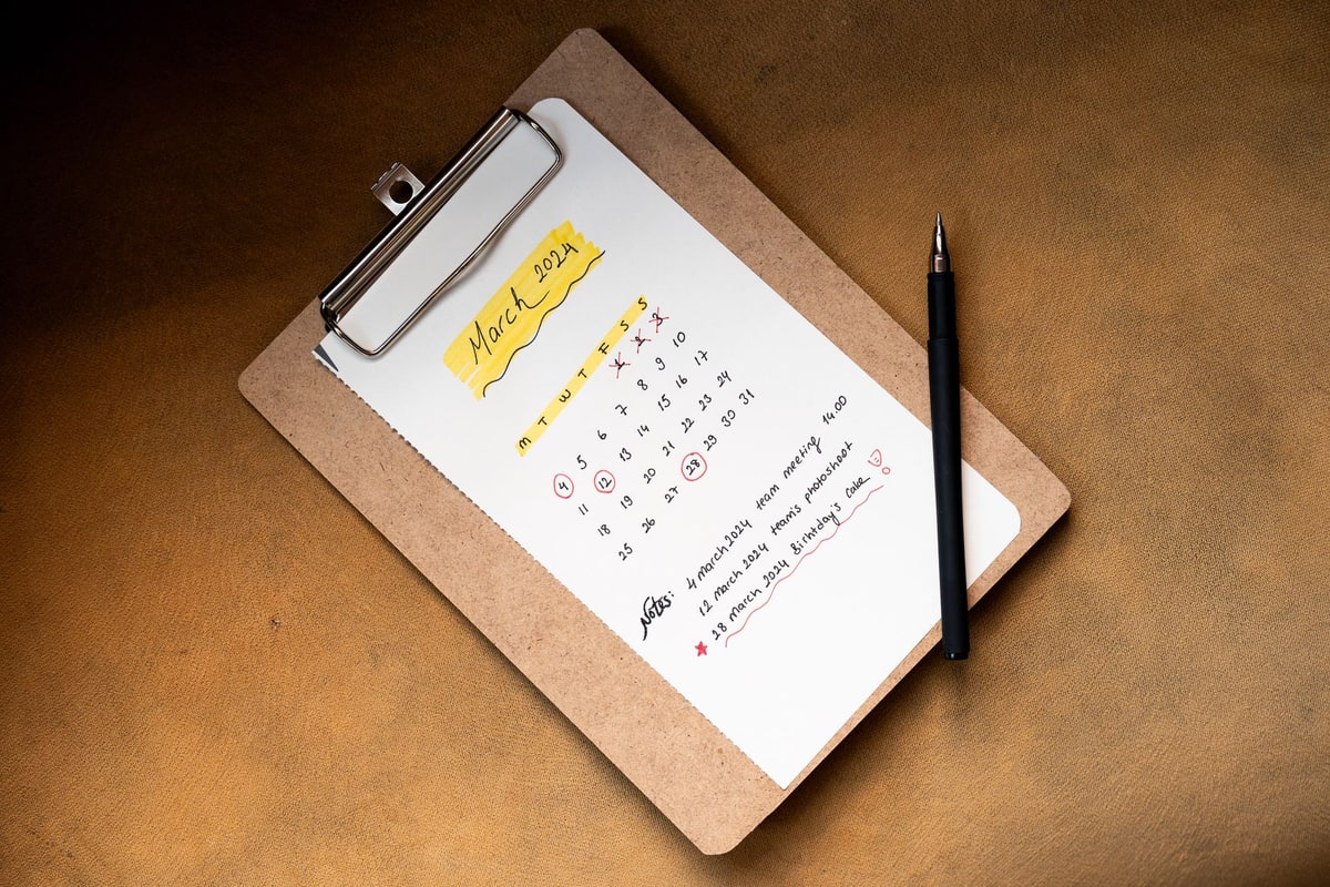 Business checklist on a clipboard for the hire-versus-automate decision