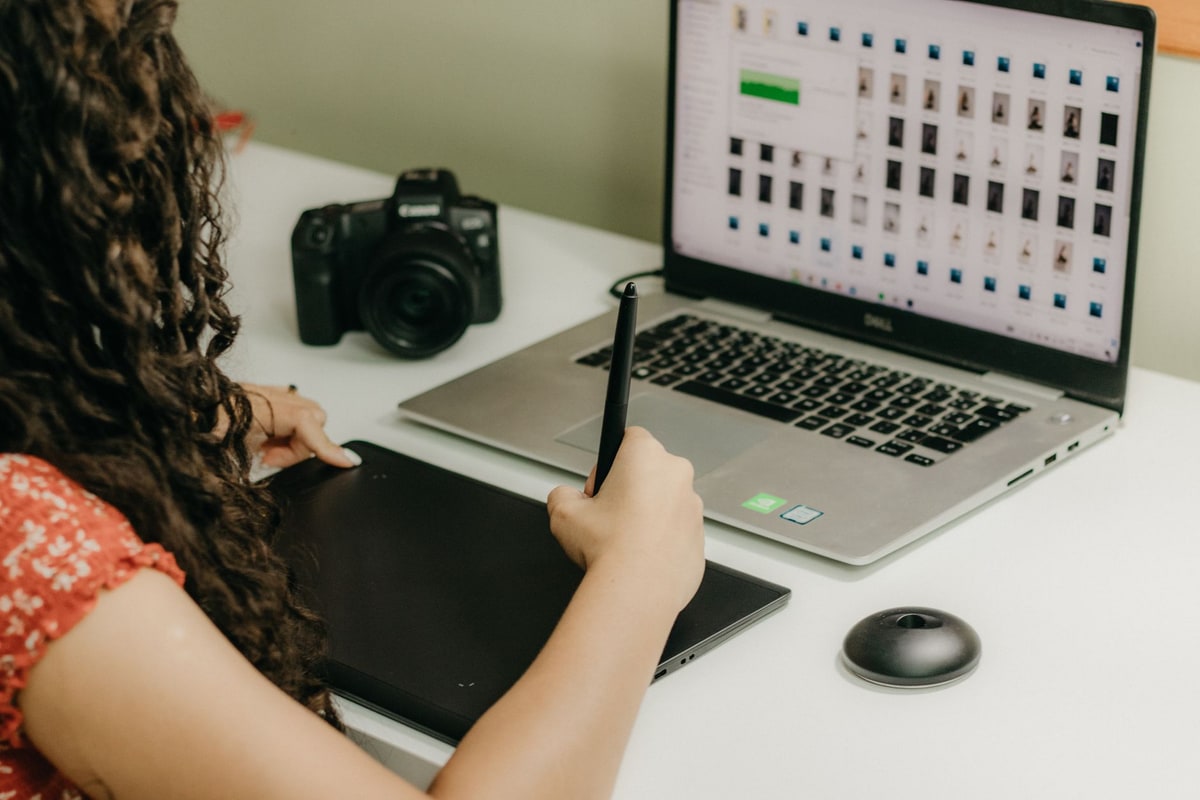 Marketing editor reviewing an AI-assisted content draft on a laptop