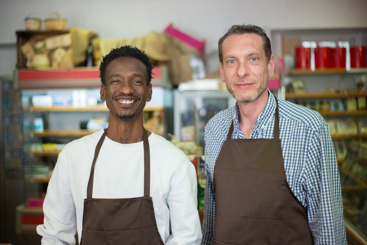 Two business owners discussing which automation platform fits their needs