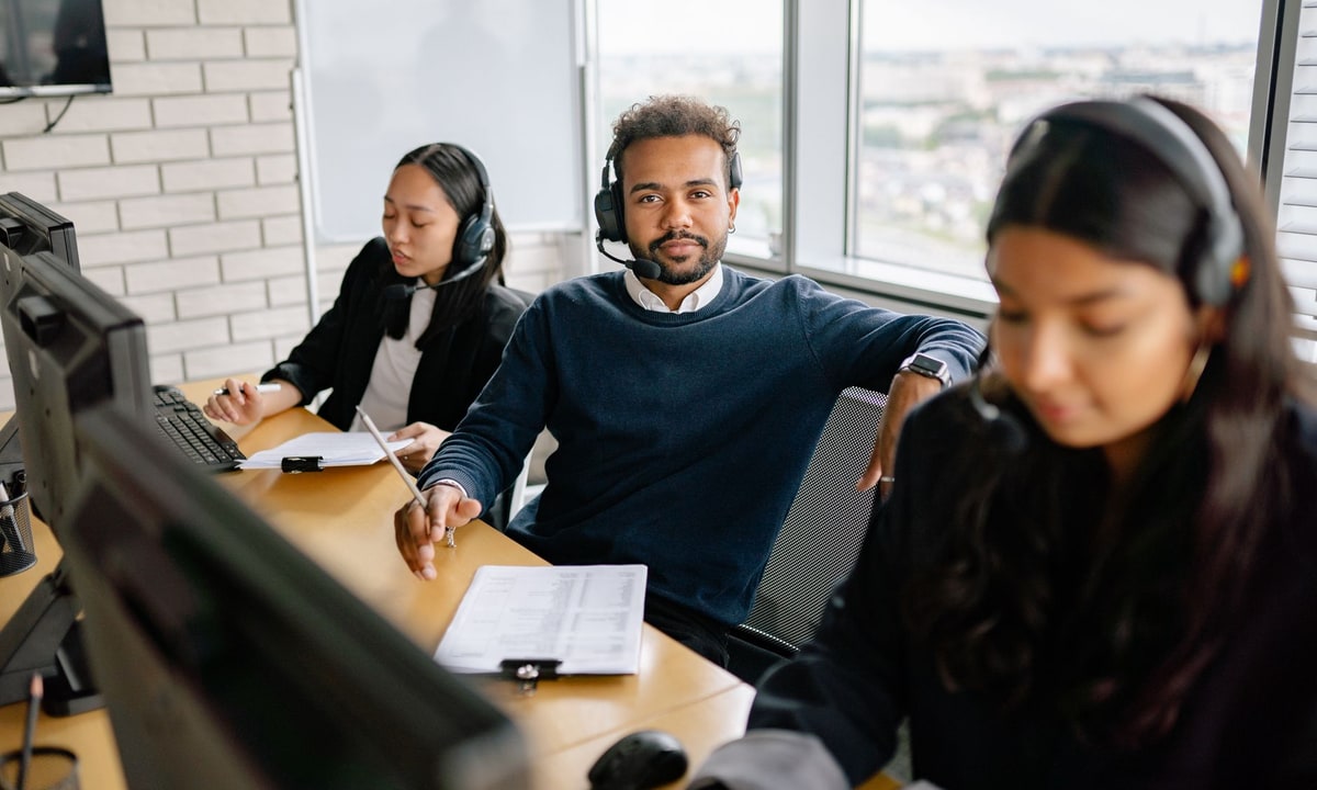 Customer support team reviewing an AI-to-human support handoff
