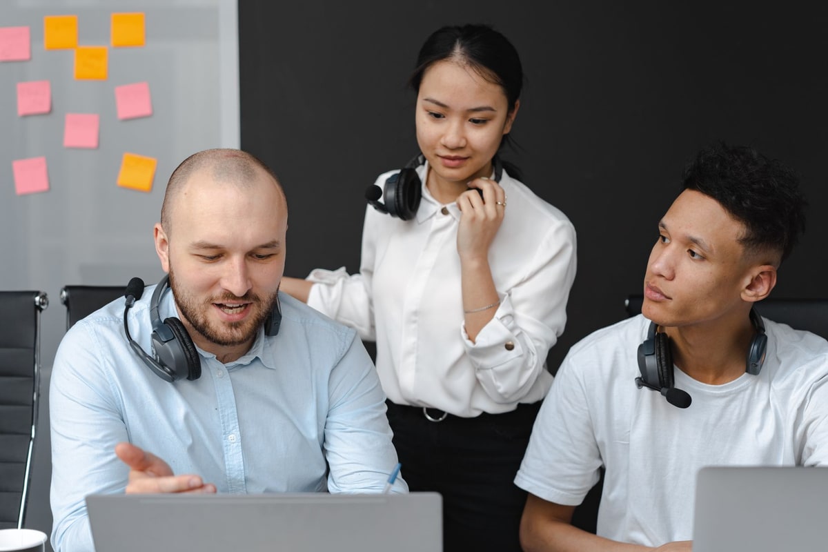 Receptionist helping a customer in a service business office