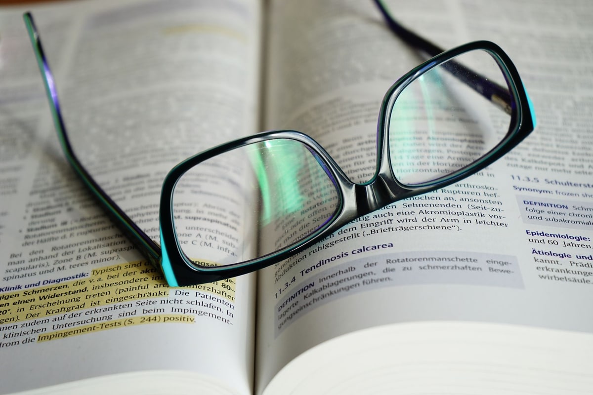 Owner reading the fine print of a service agreement