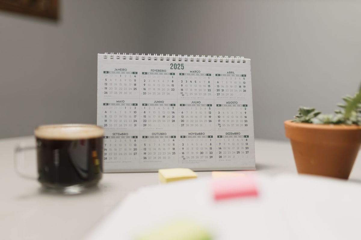 Calendar and phone being checked before an appointment reminder