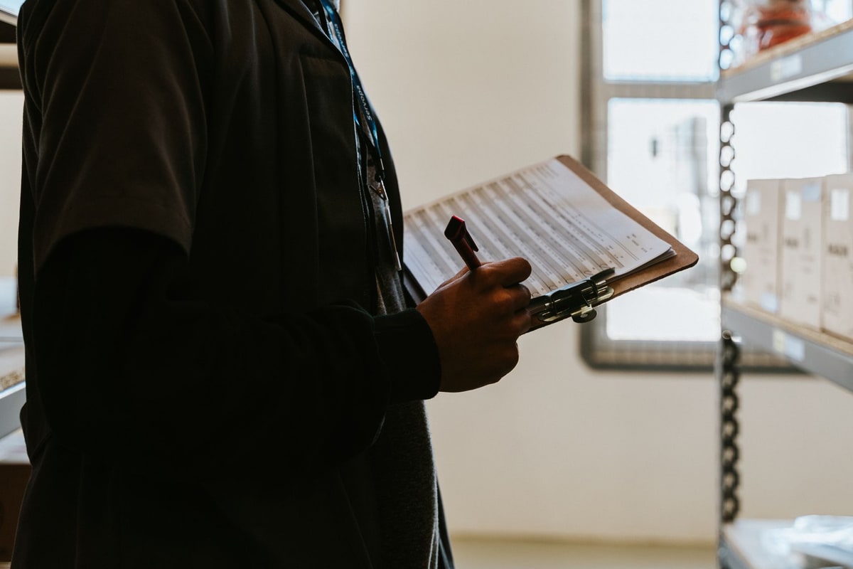 Technician reviewing an automation maintenance checklist