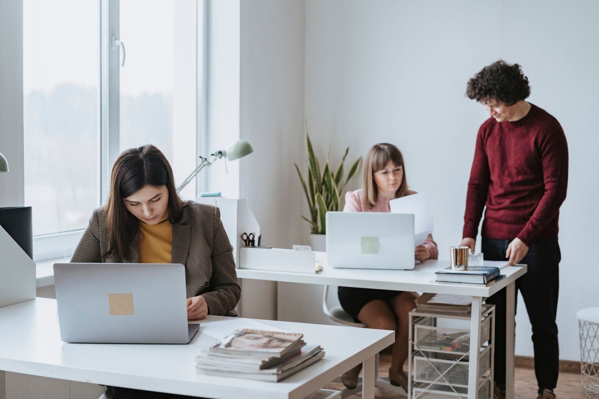 Office team reviewing customer pipeline and CRM reporting