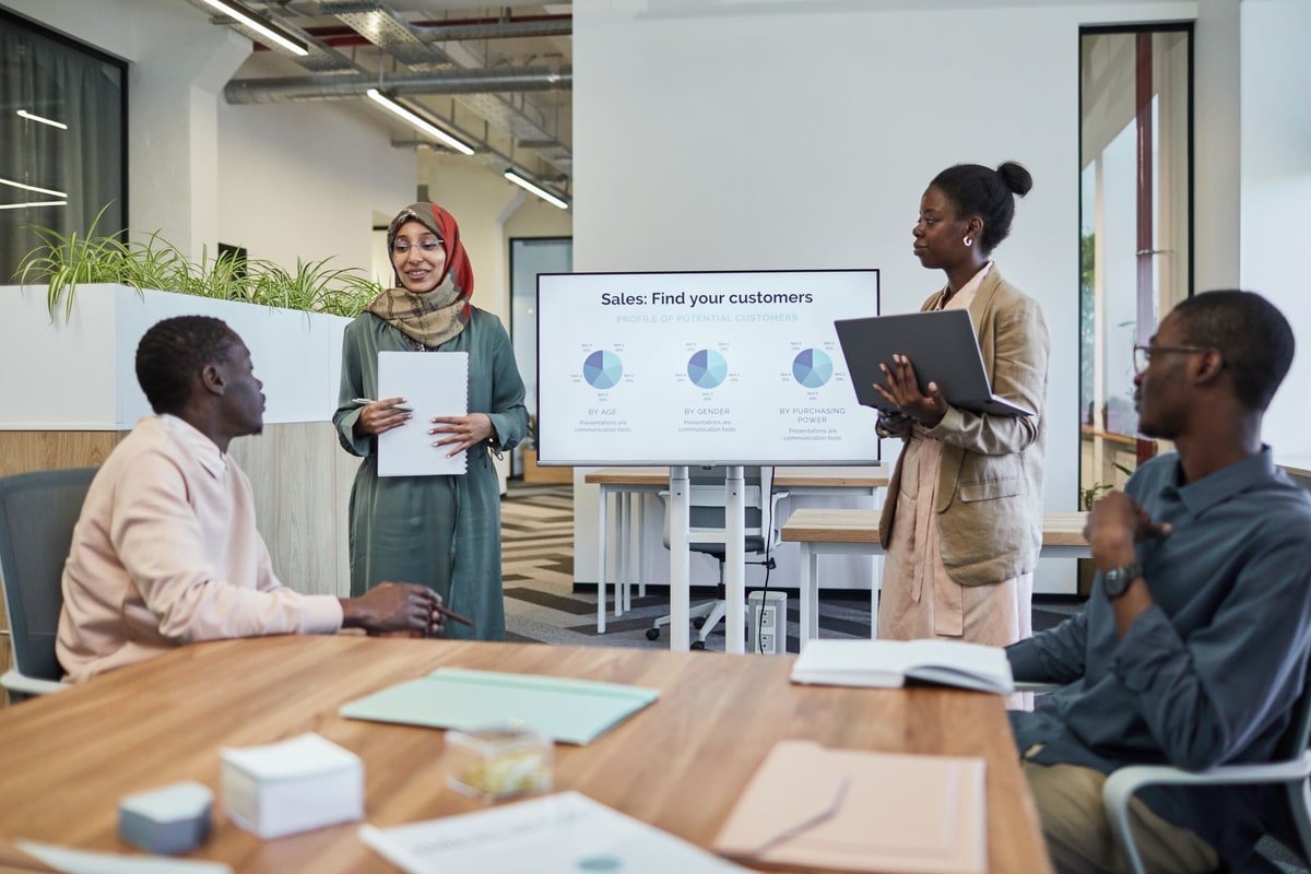 Sales team reviewing CRM contact and deal records