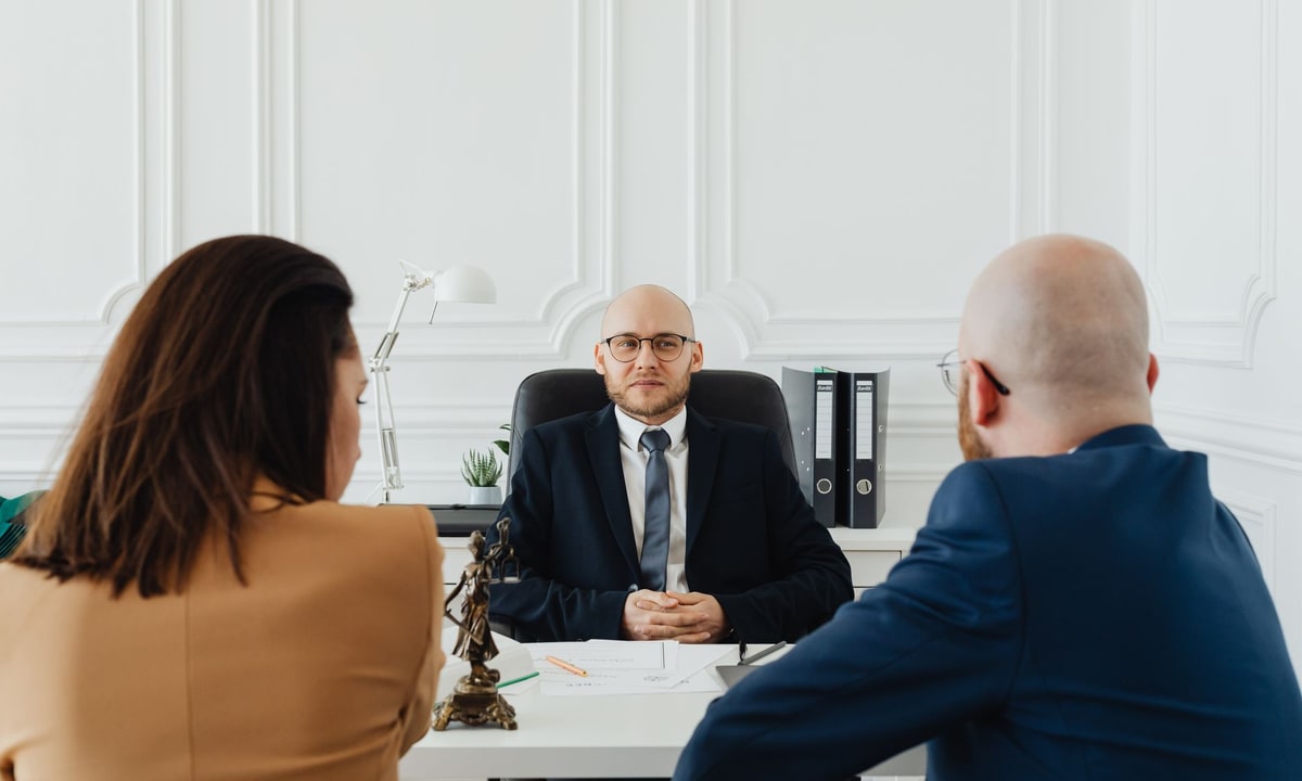 Automation consultant and business owner reviewing a workflow plan