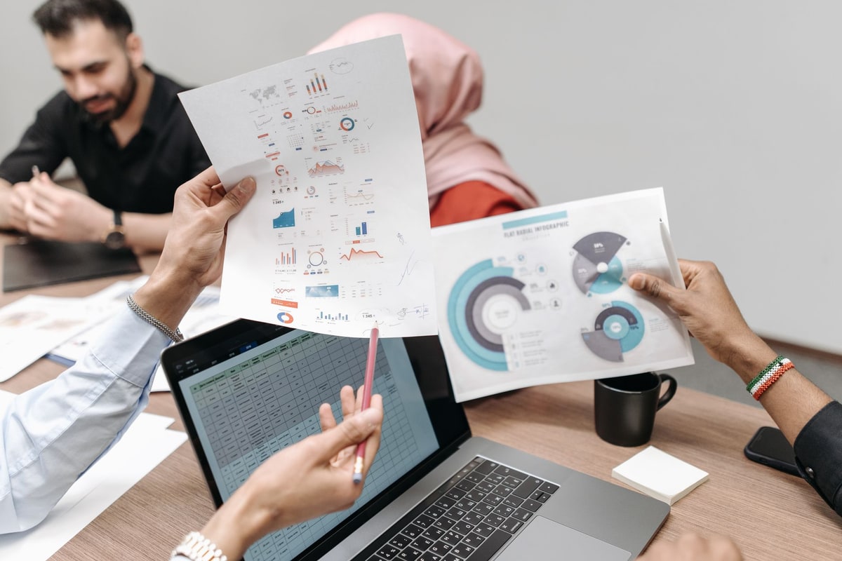 Office team reviewing customer data during a meeting