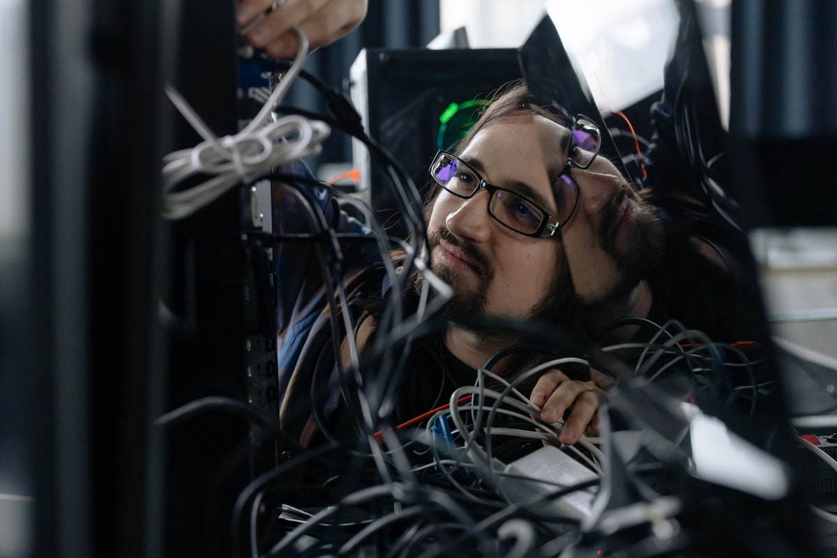 Technician verifying a record before retrying a computer task