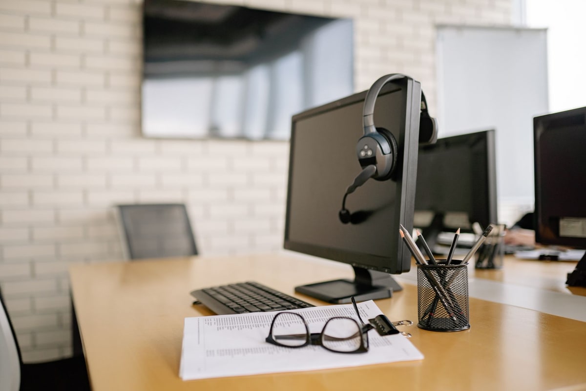 Sales representative reviewing lead records at a desk
