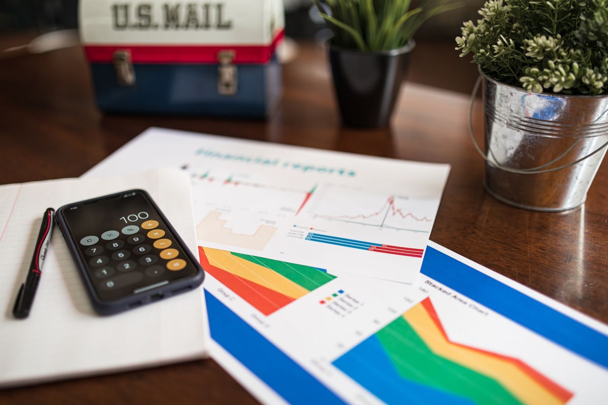 Financial reports and a calculator on a desk for ROI baseline planning