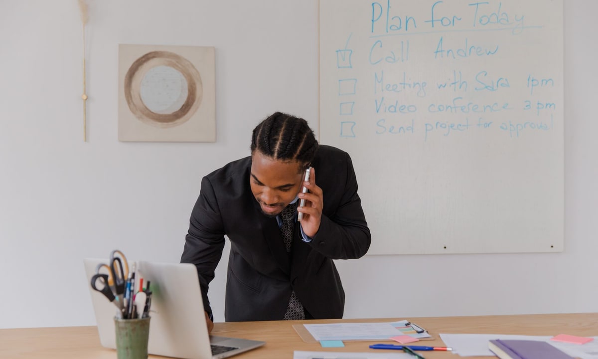 Business owner looking at a phone after a lead went quiet
