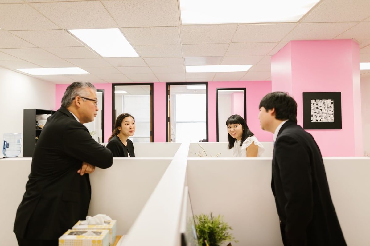 Office team reviewing workflow monitoring and operational issues
