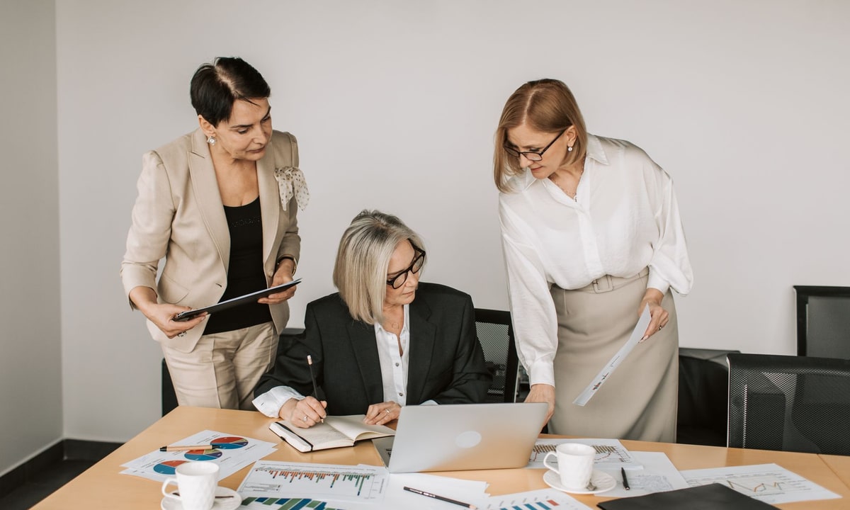 Sales team reviewing a managed proposal automation workflow