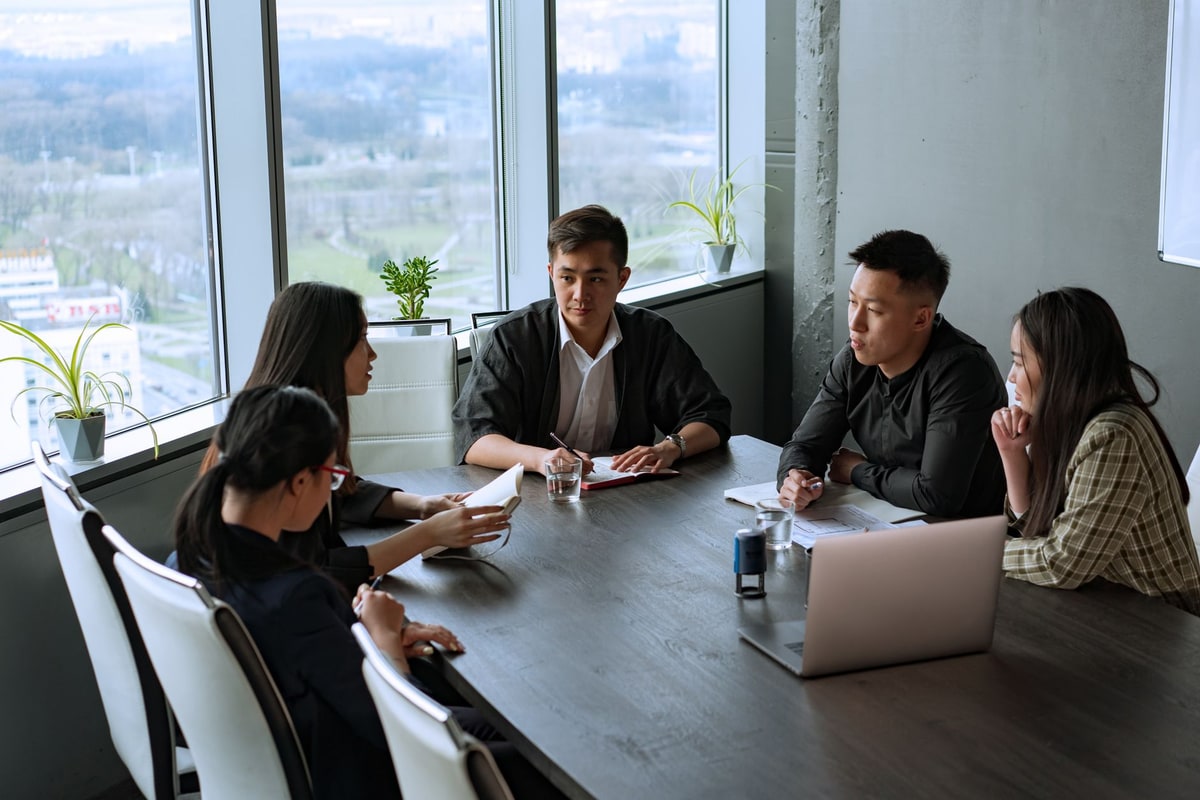 Small team reviewing a social media post before approval
