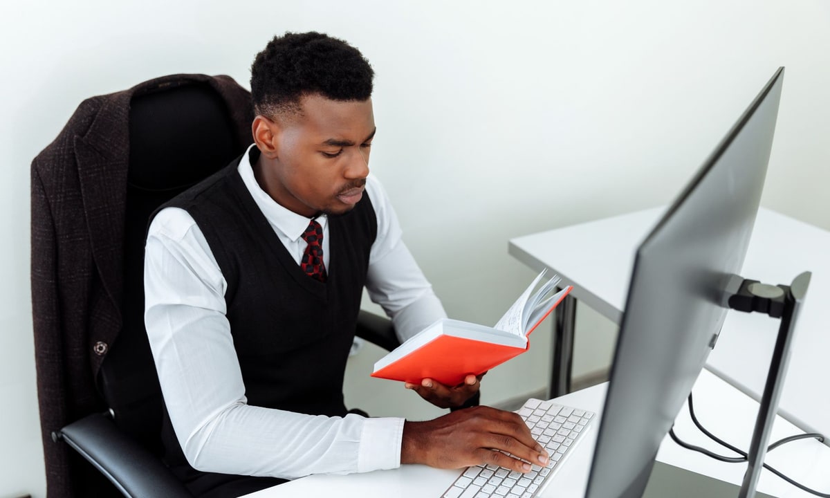Business owner reading a customer review on a phone