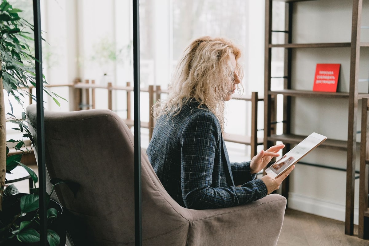 Property manager coordinating showings and follow-up on a tablet