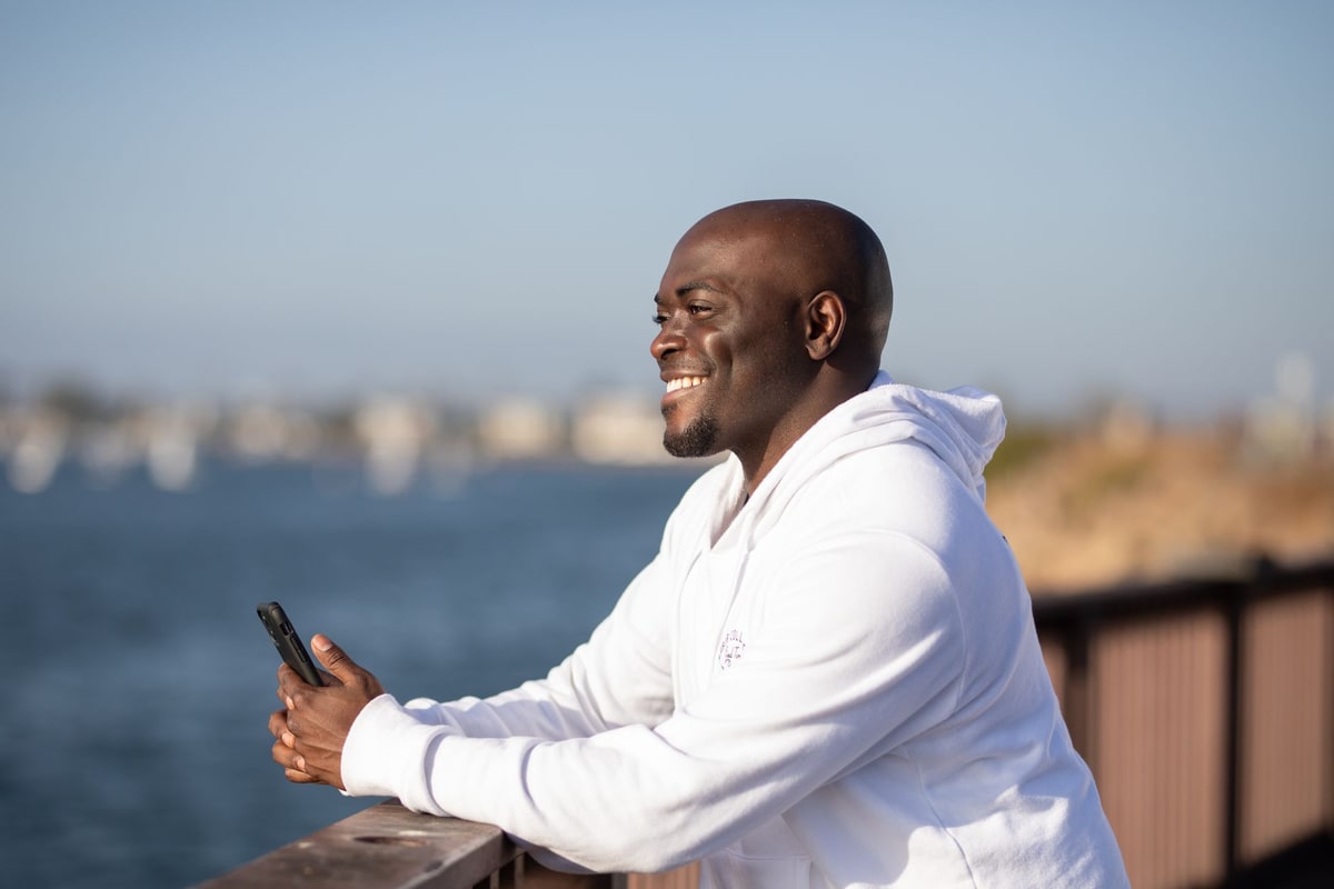Business owner reviewing social content on a phone