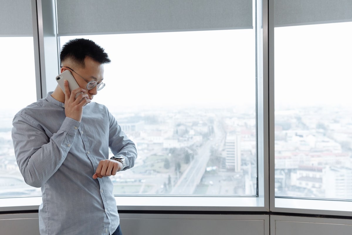 Customer reading an appointment reminder on a phone