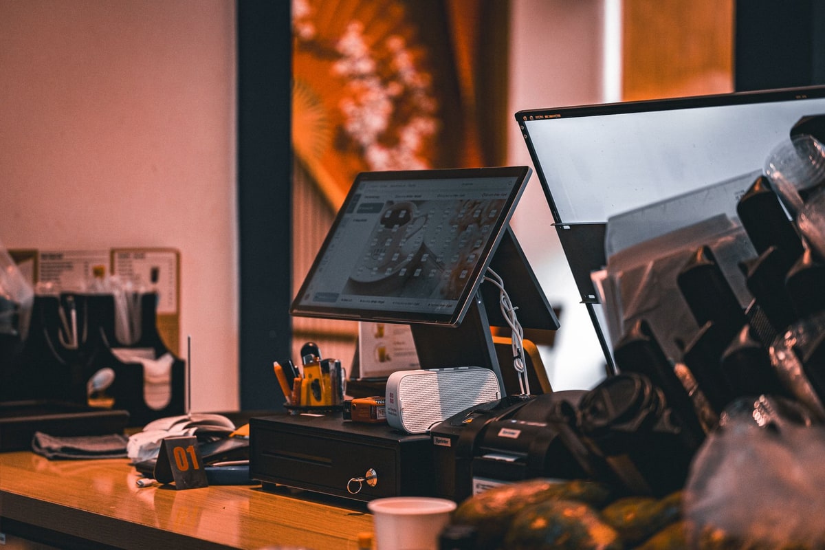 Sales representative reviewing a computer record