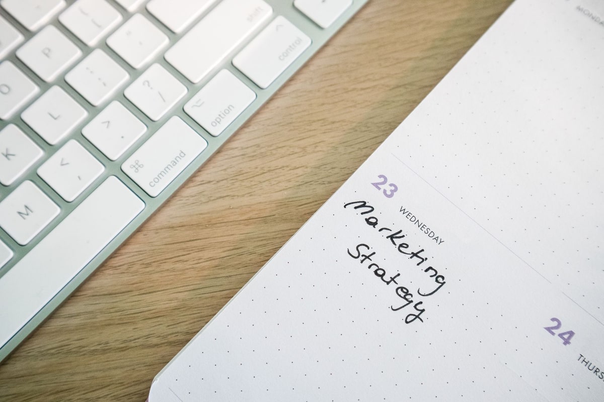 Calendar and phone on a desk for booking appointments