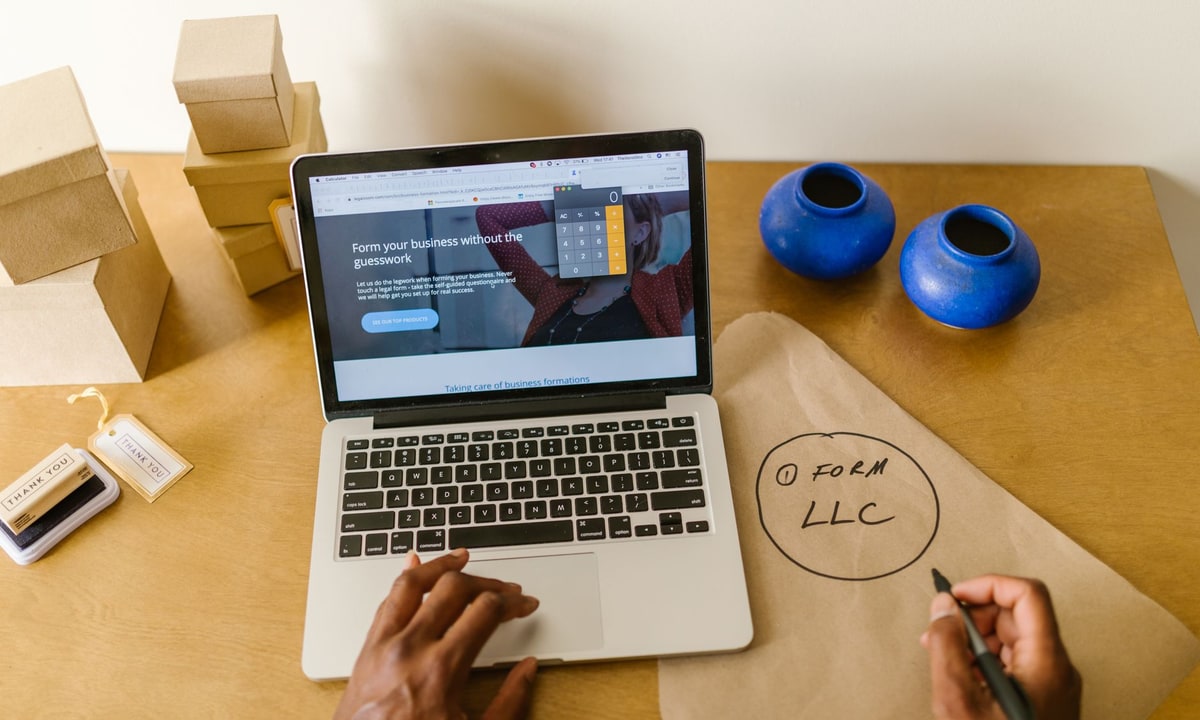 Small business operator reviewing a failed automation on a laptop